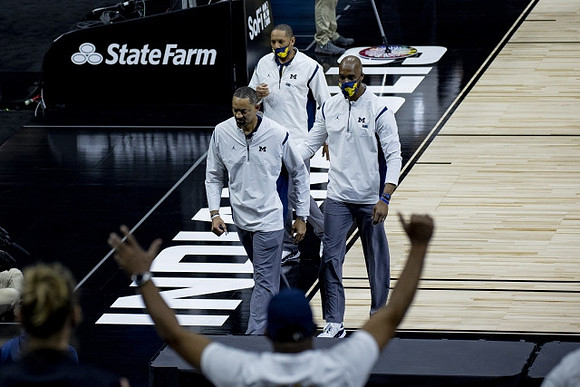 Juwan Howard, Chris Hunter, and Howard Eisley