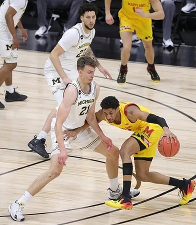 Franz Wagner (21) and Brandon Johns Jr. (23)