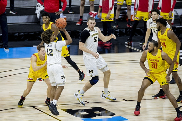Mike Smith (12), Austin Davis (51), and Brandon Johns Jr. (23)