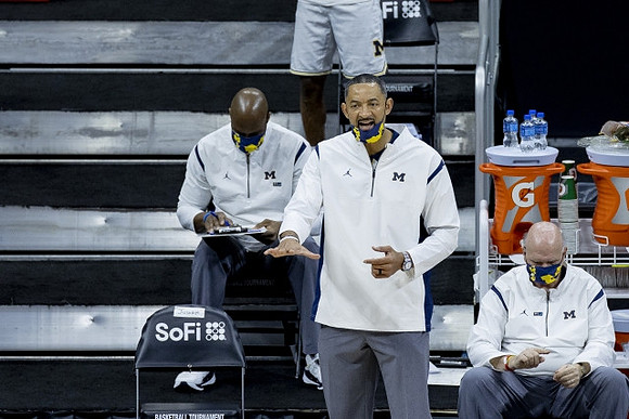 Chris Hunter, Juwan Howard, and Phil Martelli