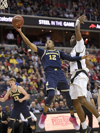 Moritz Wagner (13) and Muhammad-Ali Abdur-Rahkman (12)