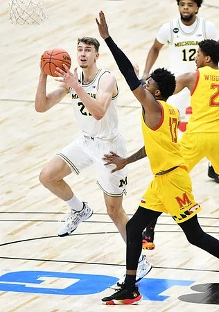 Franz Wagner (21) and Mike Smith (12)