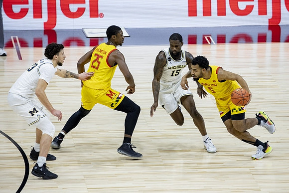 Brandon Johns Jr. (23) and Chaundee Brown Jr. (15)