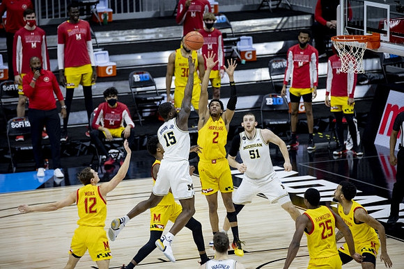 Chaundee Brown Jr. (15), Austin Davis (51), and Franz Wagner (21)