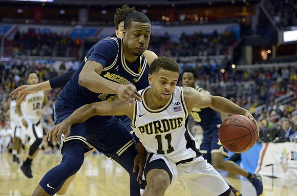 Muhammad-Ali Abdur-Rahkman (12) and Derrick Walton Jr. (10)