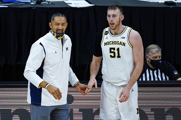 Juwan Howard and Austin Davis (51)