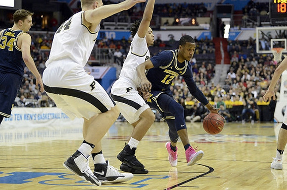 Mark Donnal (34) and Muhammad-Ali Abdur-Rahkman (12)
