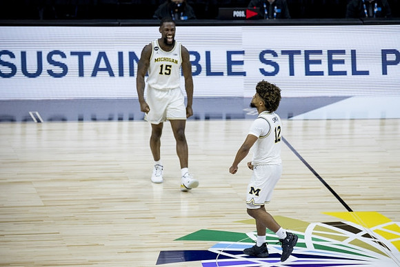 Chaundee Brown Jr. (15) and Mike Smith (12)