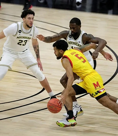 Brandon Johns Jr. (23) and Chaundee Brown Jr. (15)