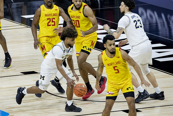 Mike Smith (12) and Brandon Johns Jr. (23)