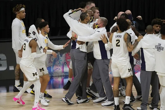 Juwan Howard and Michigan Team