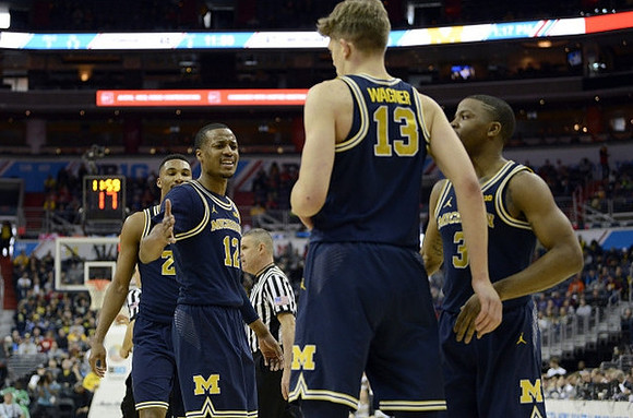 Zak Irvin (21), Muhammad-Ali Abdur-Rahkman (12), Moritz Wagner (13), and Xavier Simpson (3)