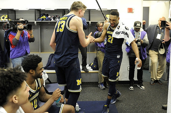 D.J. Wilson (5), Derrick Walton Jr. (10), Moritz Wagner (13), and Zak Irvin (21)