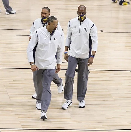Juwan Howard, Howard Eisley, and Chris Hunter