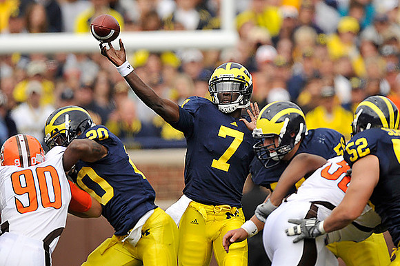 Michael Shaw (20), Devin Gardner (7), David Molk (50), and Stephen Schilling (52)
