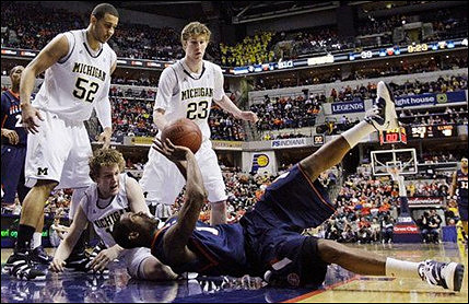 Jordan Morgan (52), Zack Novak (0), and Evan Smotrycz (23)