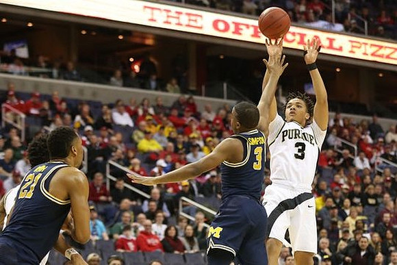 Zak Irvin (21) and Xavier Simpson (3)