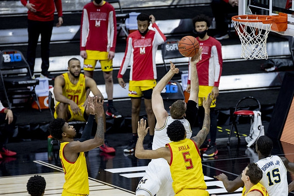 Austin Davis (51) and Chaundee Brown Jr. (15)