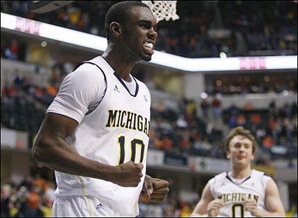 Tim Hardaway Jr. (10) and Zack Novak (0)