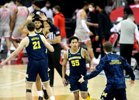 Franz Wagner (21), Isaiah Livers (2), and Eli Brooks (55)