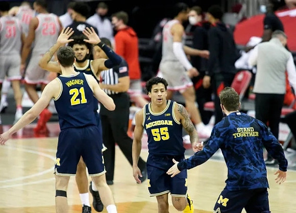 Franz Wagner (21), Isaiah Livers (2), and Eli Brooks (55)