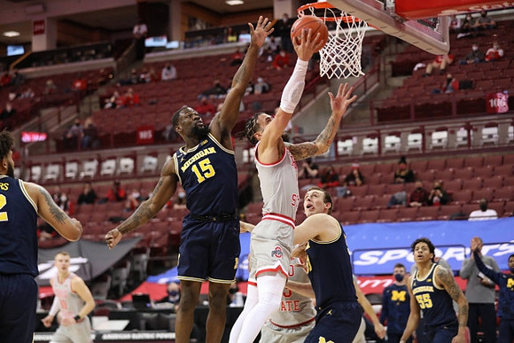 Isaiah Livers (2), Chaundee Brown Jr. (15), Austin Davis (51), and Eli Brooks (55)