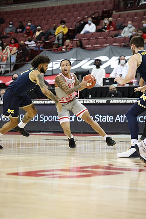 Isaiah Livers (2) and Hunter Dickinson (1)