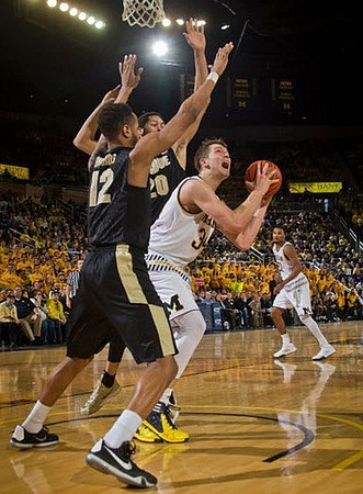 Mark Donnal (34) and Zak Irvin (21)