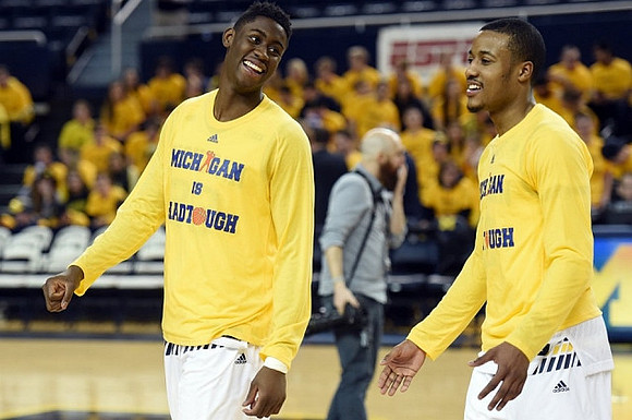 Caris LeVert (23) and Muhammad-Ali Abdur-Rahkman (12)