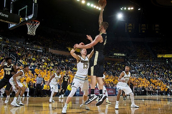 Aubrey Dawkins (24), Derrick Walton Jr. (10), Moritz Wagner (13), and Zak Irvin (21)
