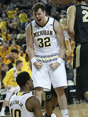 Derrick Walton Jr. (10) and Ricky Doyle (32)