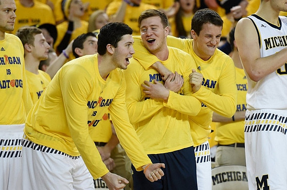 Brent Hibbitts (0), Sean Lonergan (20), Spike Albrecht (2), and Andrew Dakich (11)