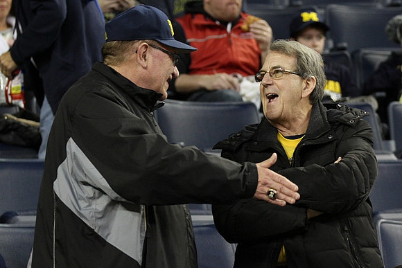 Jon Falk and Lloyd Carr