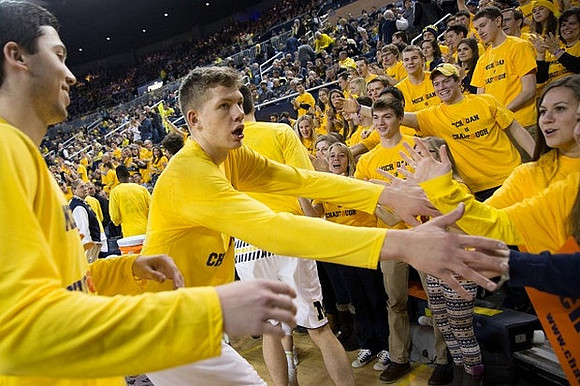 Sean Lonergan (20) and Moritz Wagner (13)