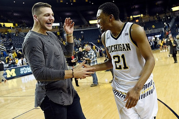 Mitch McGary and Zak Irvin (21)