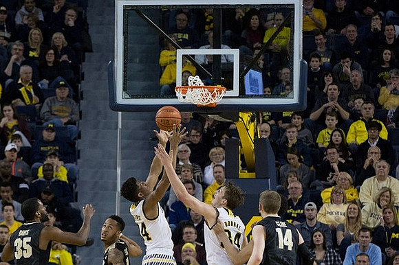 Aubrey Dawkins (24) and Mark Donnal (34)