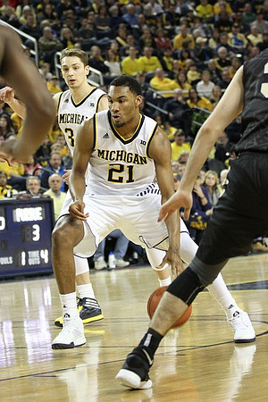 Mark Donnal (34) and Zak Irvin (21)