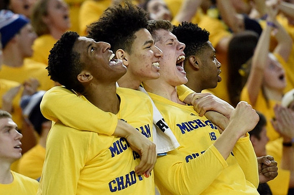 Aubrey Dawkins (24), D.J. Wilson (5), Moritz Wagner (13), and Kameron Chatman (3)