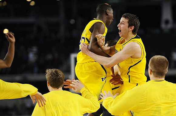 Caris LeVert (23) and Nik Stauskas (11)
