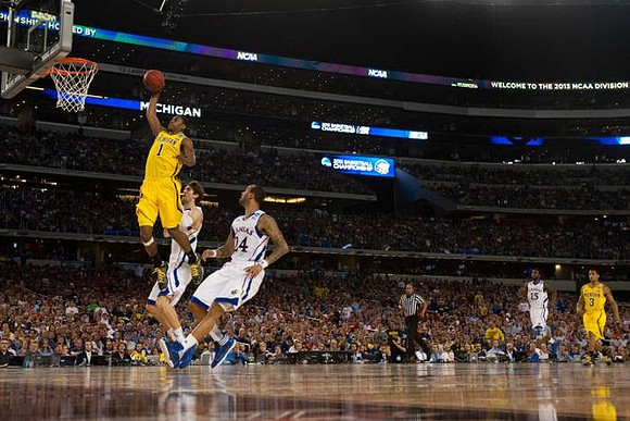 Glenn Robinson III (1) and Trey Burke (3)