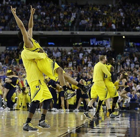 Corey Person (32), Trey Burke (3), Blake McLimans (22), and Tim Hardaway Jr. (10)