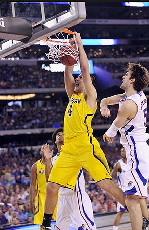 Mitch McGary (4) and Glenn Robinson III (1)