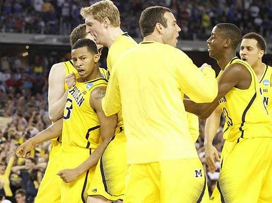 Trey Burke (3), Blake McLimans (22), Josh Bartelstein (20), Caris LeVert (23), and Jordan Morgan (52)