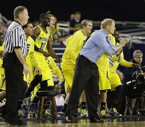 Jordan Morgan (52), Tim Hardaway Jr. (10), Max Bielfeldt (44), Blake McLimans (22), John Beilein, Josh Bartelstein (20), and Corey Person (32)