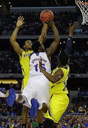 Glenn Robinson III (1) and Tim Hardaway Jr. (10)