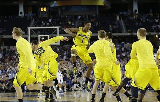 Blake McLimans (22), Jordan Morgan (52), Josh Bartelstein (20), Glenn Robinson III (1), Matt Vogrich (13), Mitch McGary (4), and Max Bielfeldt (44)