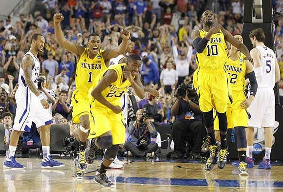 Glenn Robinson III (1), Caris LeVert (23), Tim Hardaway Jr. (10), and Jordan Morgan (52)