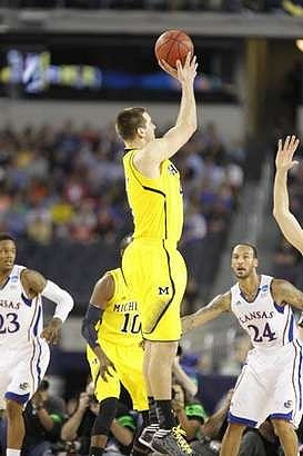 Tim Hardaway Jr. (10) and Mitch McGary (4)