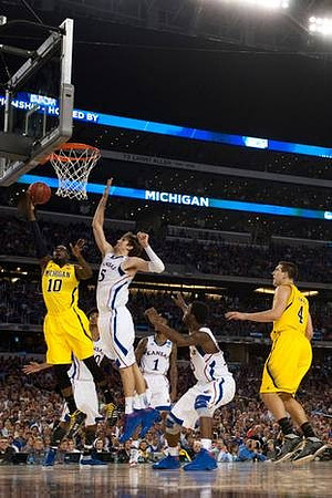 Tim Hardaway Jr. (10) and Mitch McGary (4)