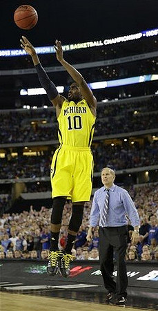 Tim Hardaway Jr. (10) and John Beilein